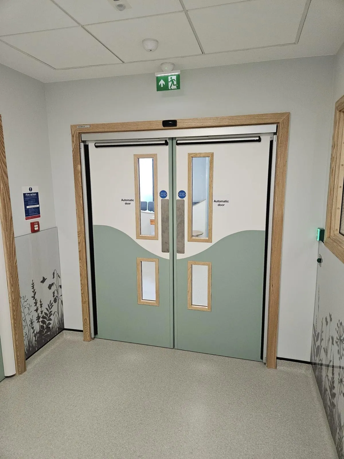 Fire-rated automatic double doors on a hospital escape route