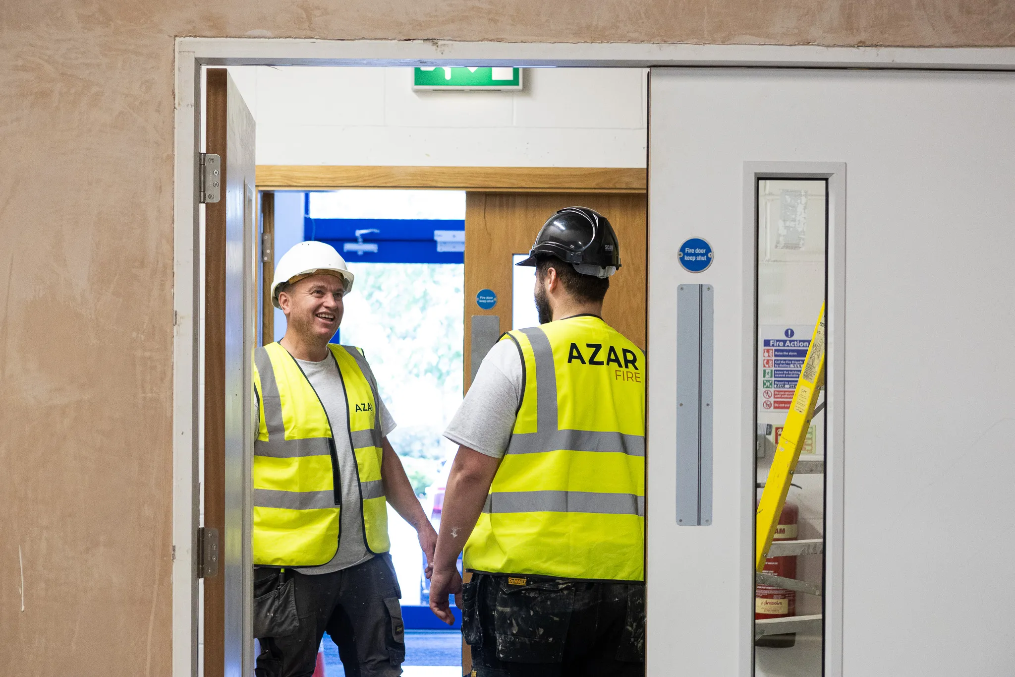 Azar Fire operatives on site at a fire door